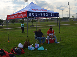 Players Watch The Match